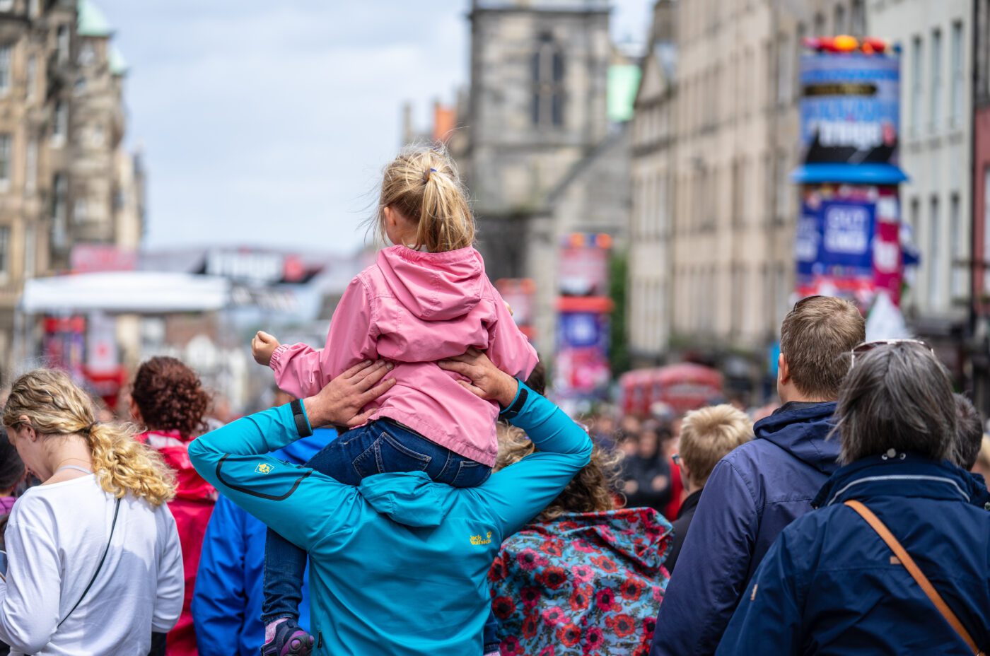 Little girl On Her Dads Shoulders Edinburgh Festival Fringe