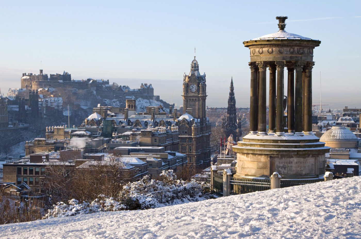 A snowy Calton Hill at Christmas time in Edinburgh.