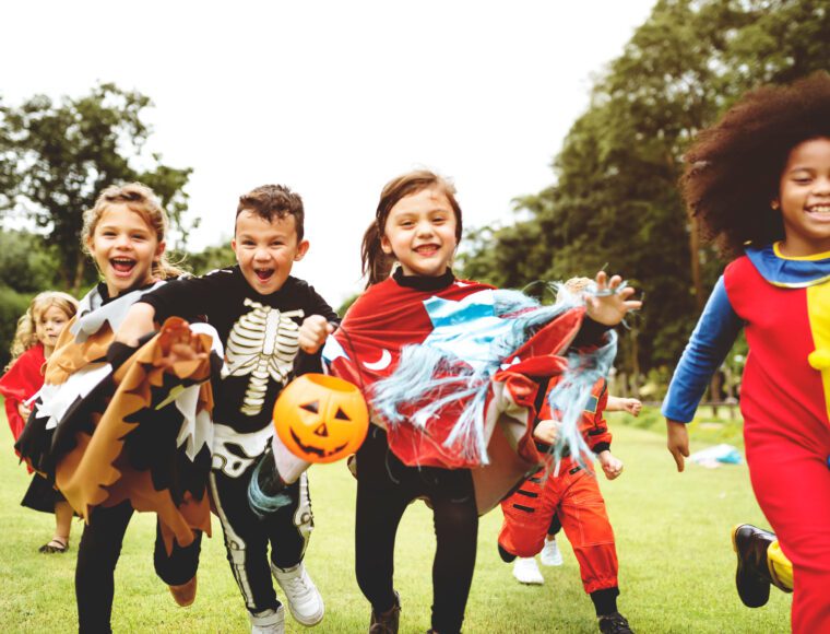 Children in costumes enjoying Halloween Family day at Ainstree Racecourse in Liverpool